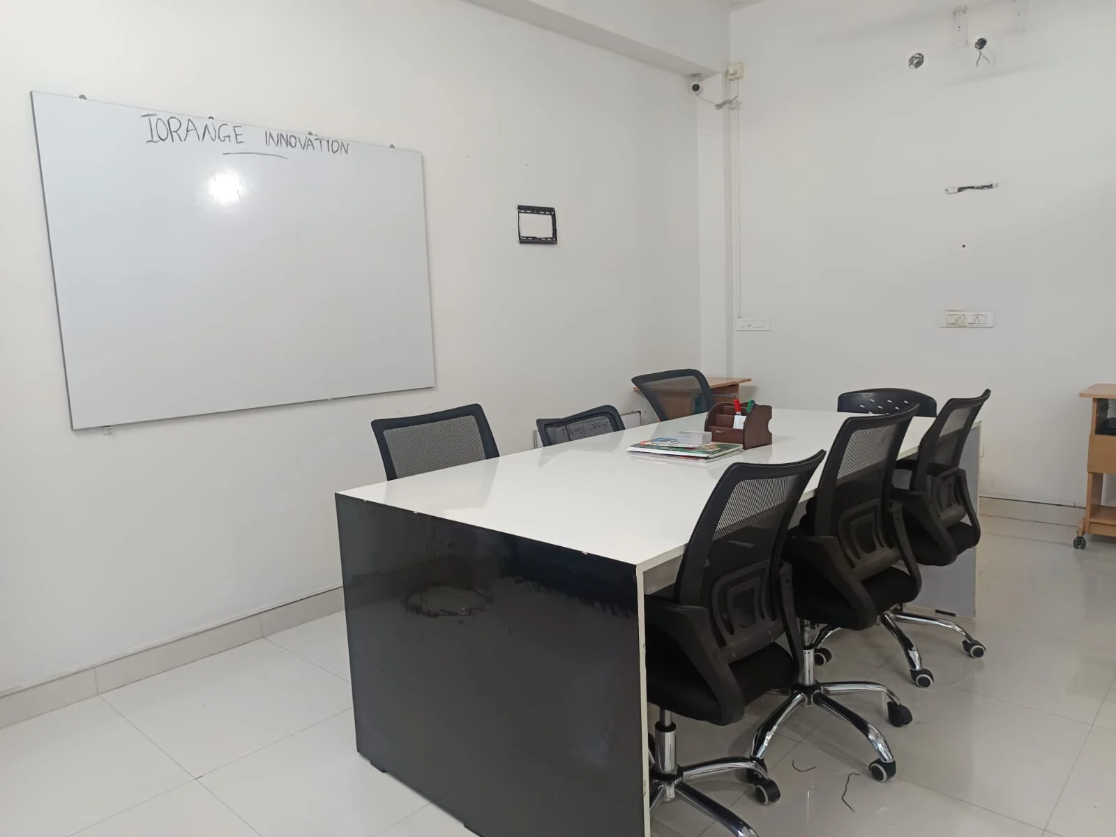 Business strategy discussion at the iOrange Innovation office