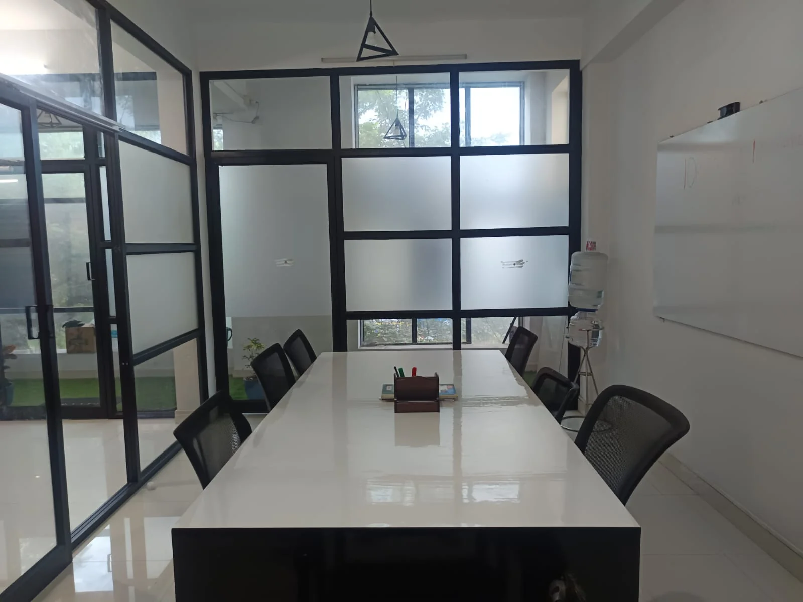 iOrange Innovation team discussing project strategy with clients