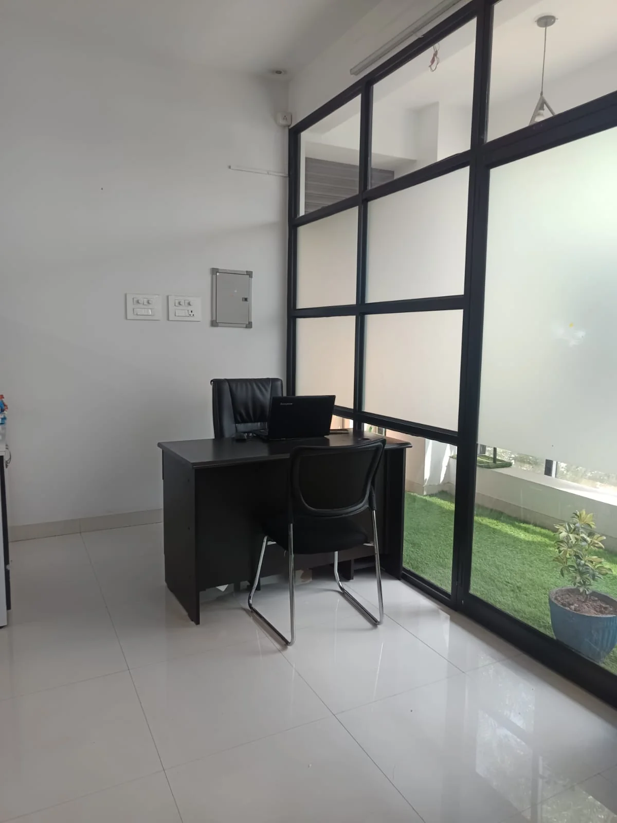 iOrange Innovation team members working together in the office workspace